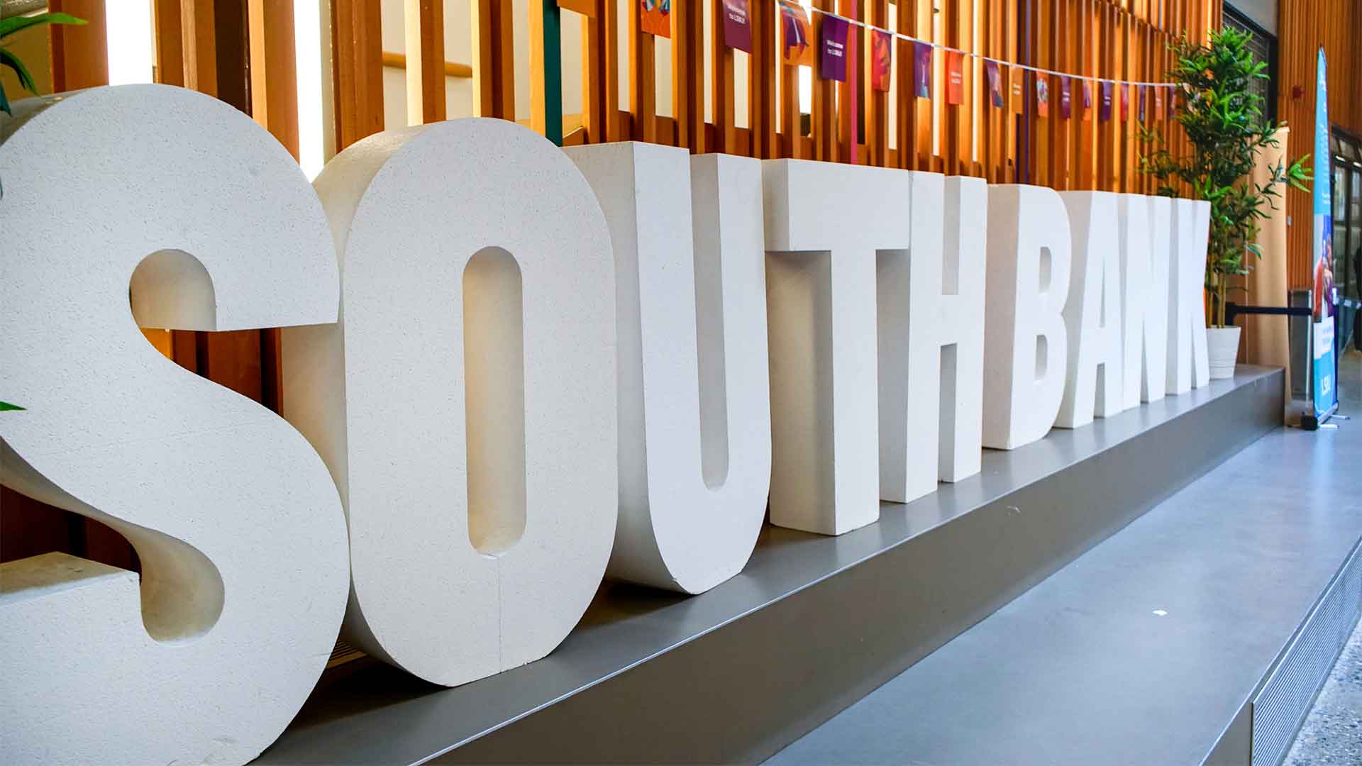 A photograph of giant letters in a University building reading Southbank